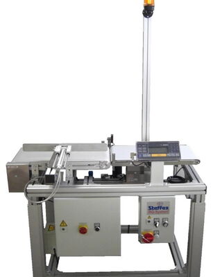 Weighing system for bottles